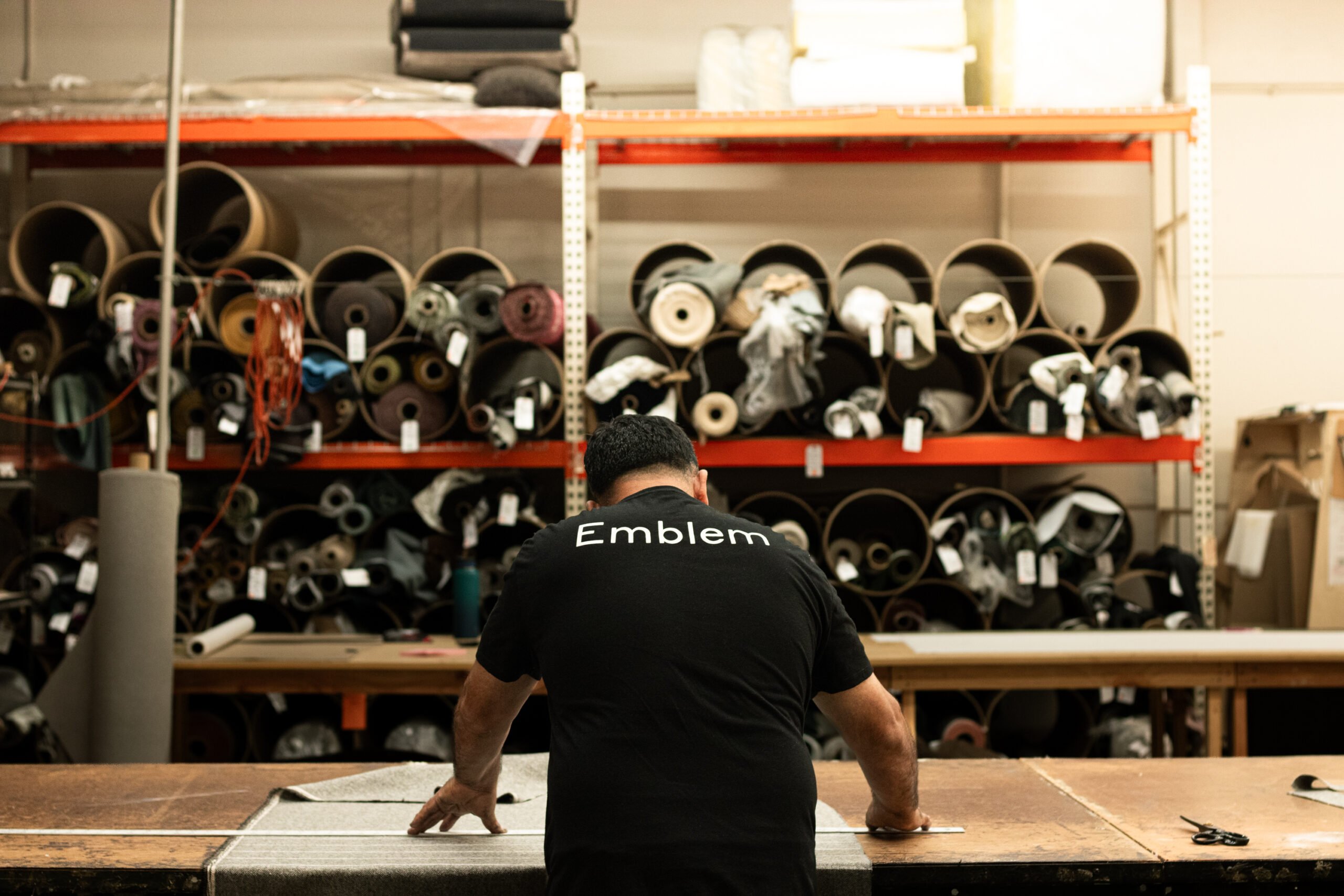 Emblem employee in workshop